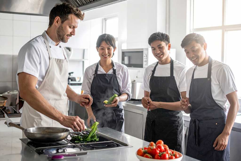 Kucharze w fartuchach